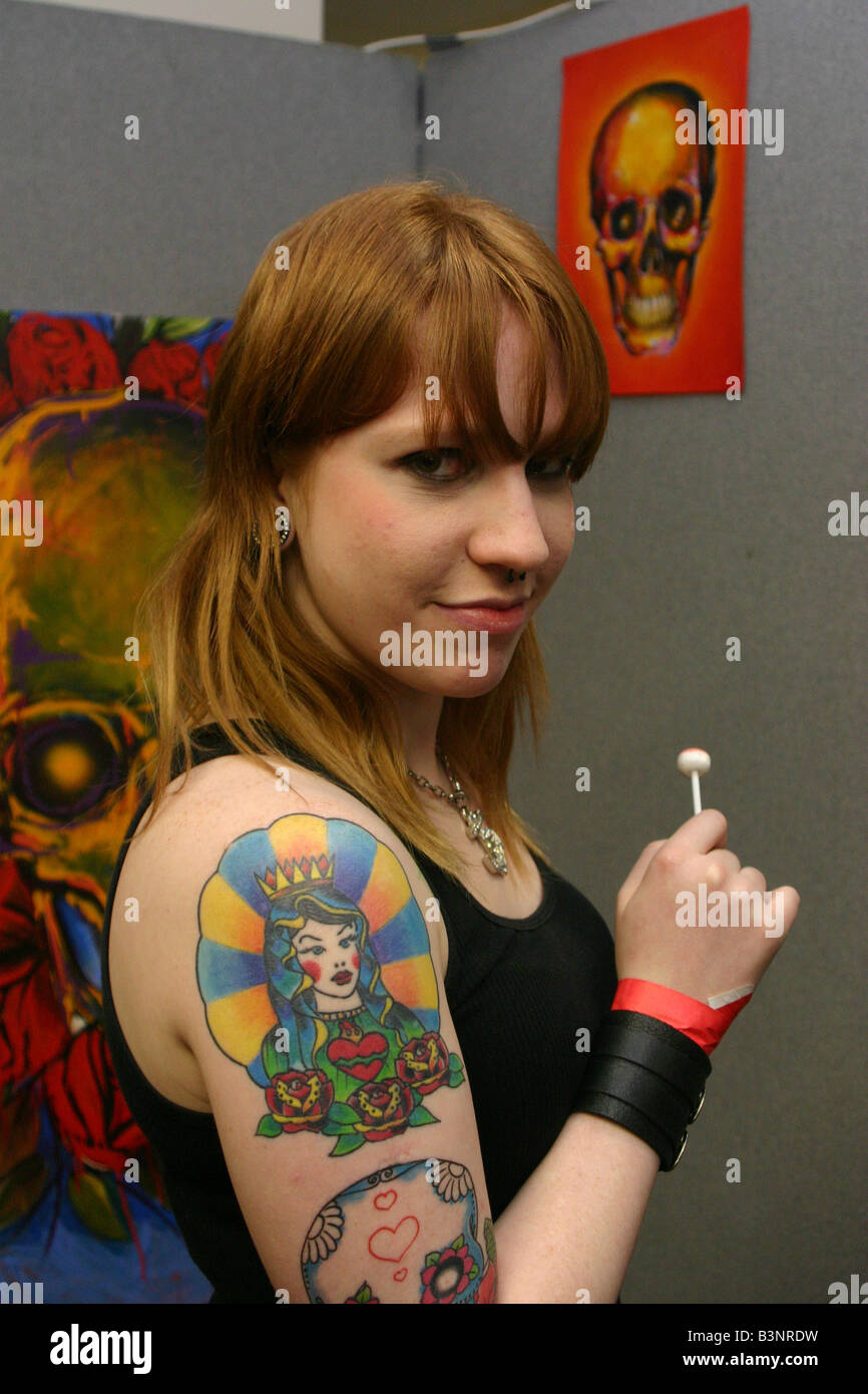 Female tattooed at Tattoo show london 07 Stock Photo