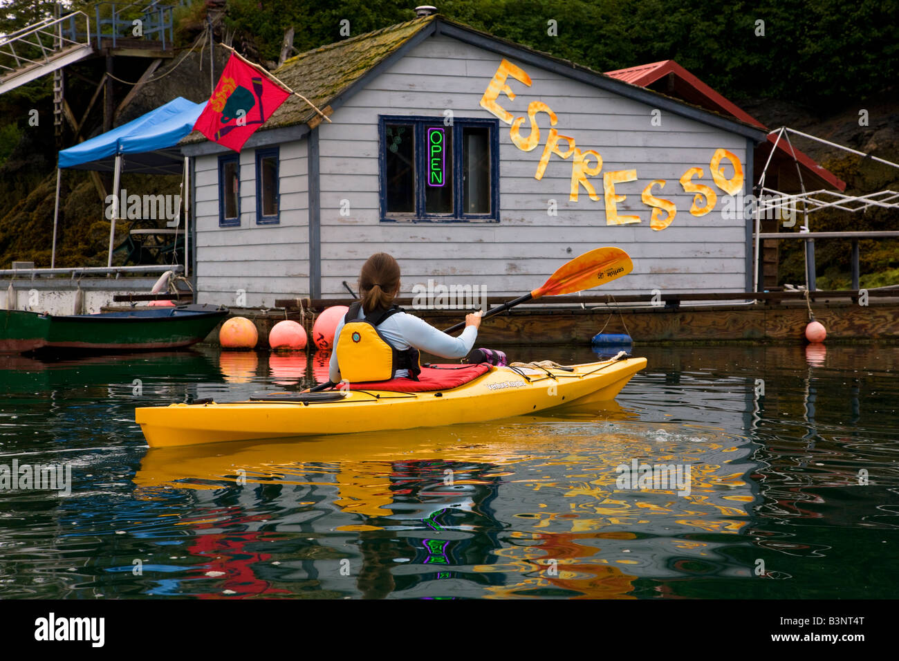 Kayaking to a floating Espresso stand in Halibut Cove Kachemak Bay near