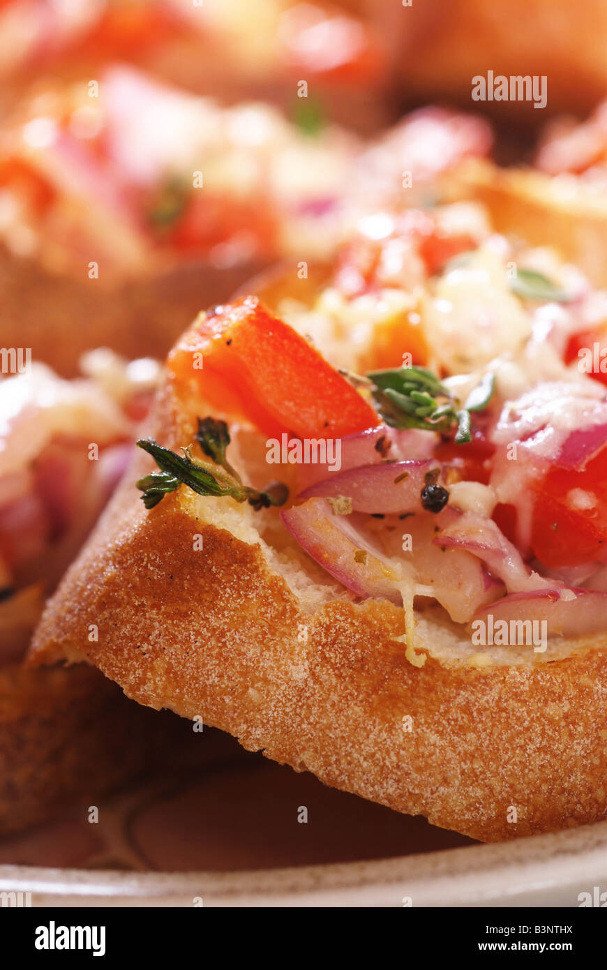 Platter of bruschetta with tomato and red onion Stock Photo Alamy