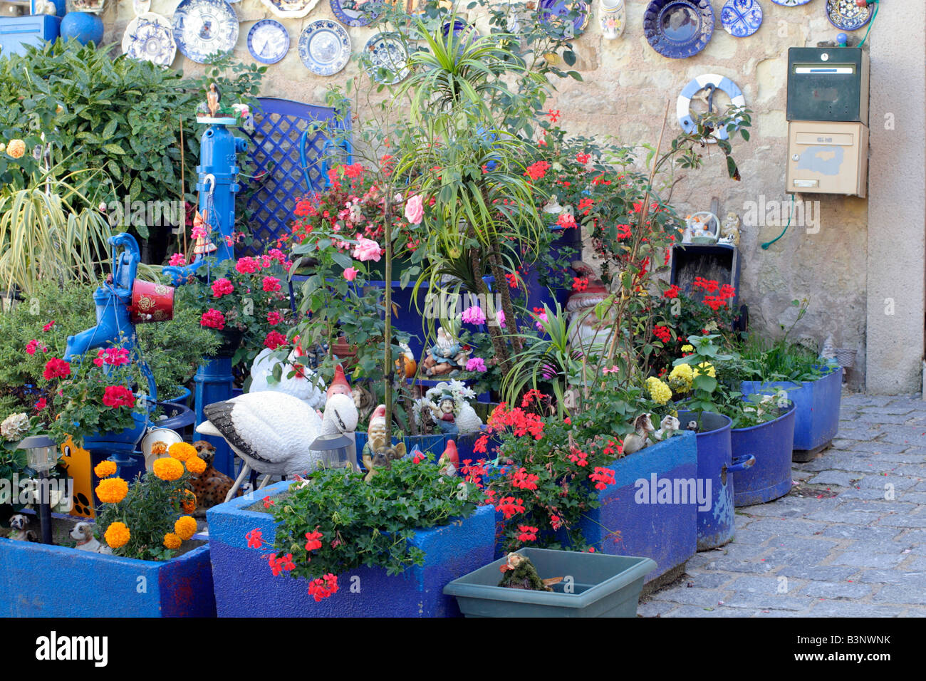 PLANTERS IN A COURTYARD ST AIGNAN LOIRE VALLEY FRANCE Stock Photo