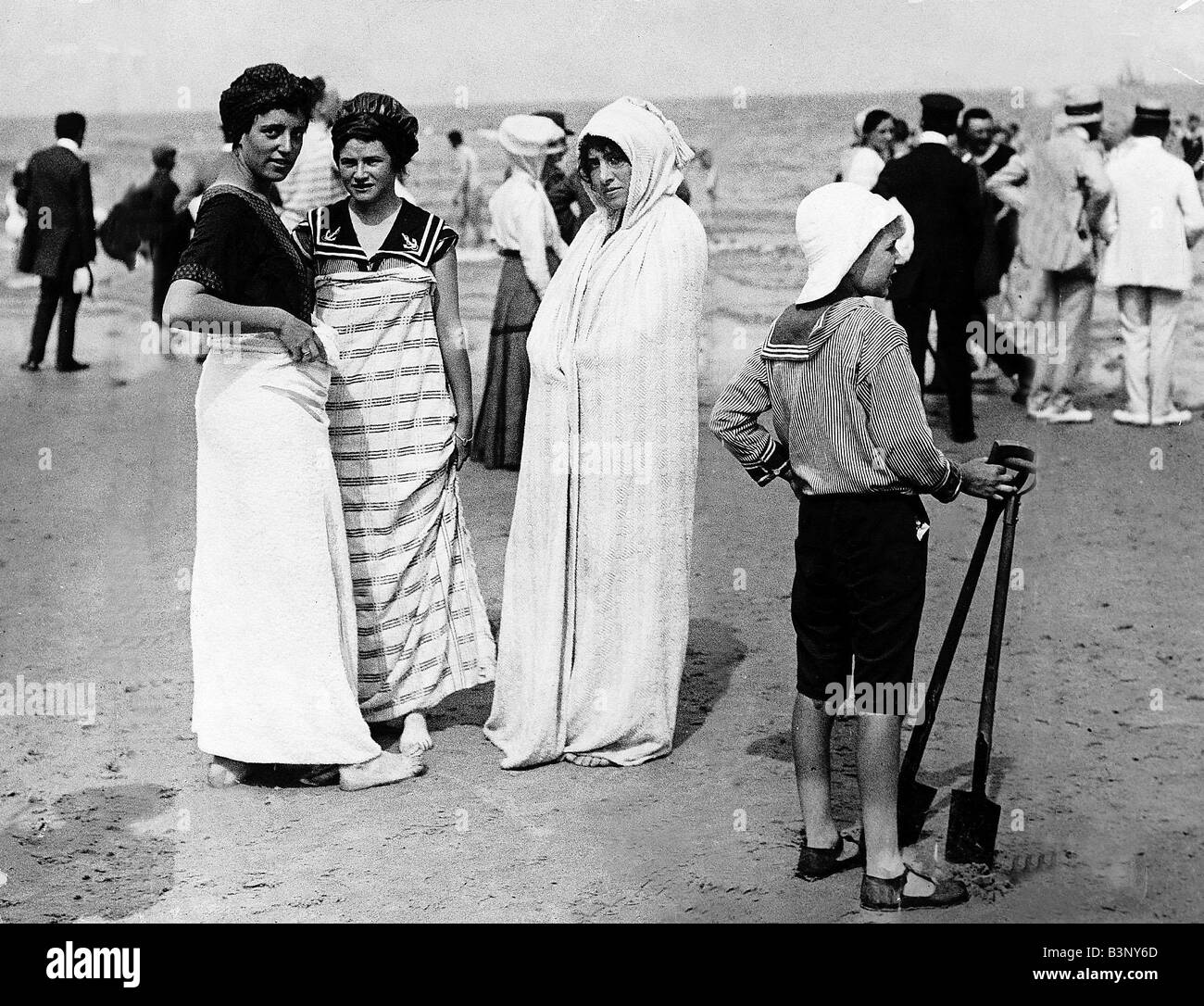 Bathers at Norderney France modelling fashion on a beach in 1911