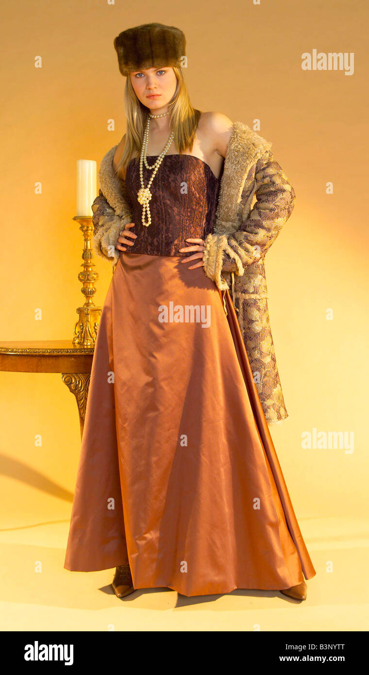 Edwardian Fashion Feature November 2002 A Model wearing hat coat lace corset long skirt and pearl necklace Stock Photo