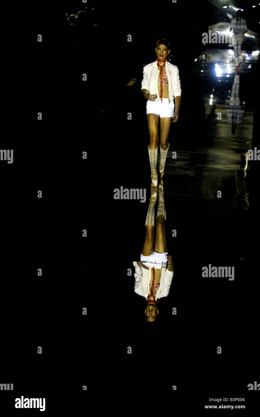 London fashion Week September 2003 Models in the Julian Macdonald Show at London Fashion week wearing white short and a jacket Stock Photo