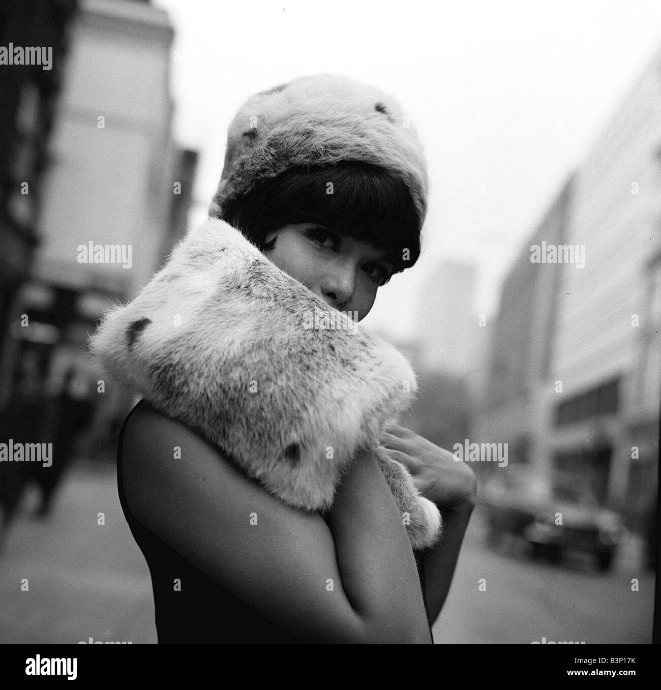 model wears a fur hat and muff Fashion 
