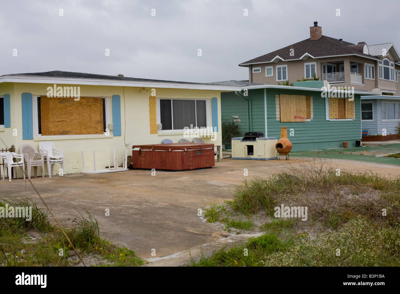 Oceanfront homes, Jacksonville Beach, Florida boarded up for protection
