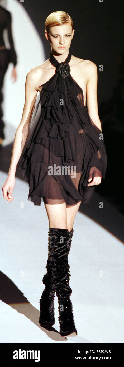 Jacquetta Wheeler 17 year old British Model February 1999 is pictured in the New Face of Gucci fashion show Wearing a black chiffon dress with over the knee boots Stock Photo
