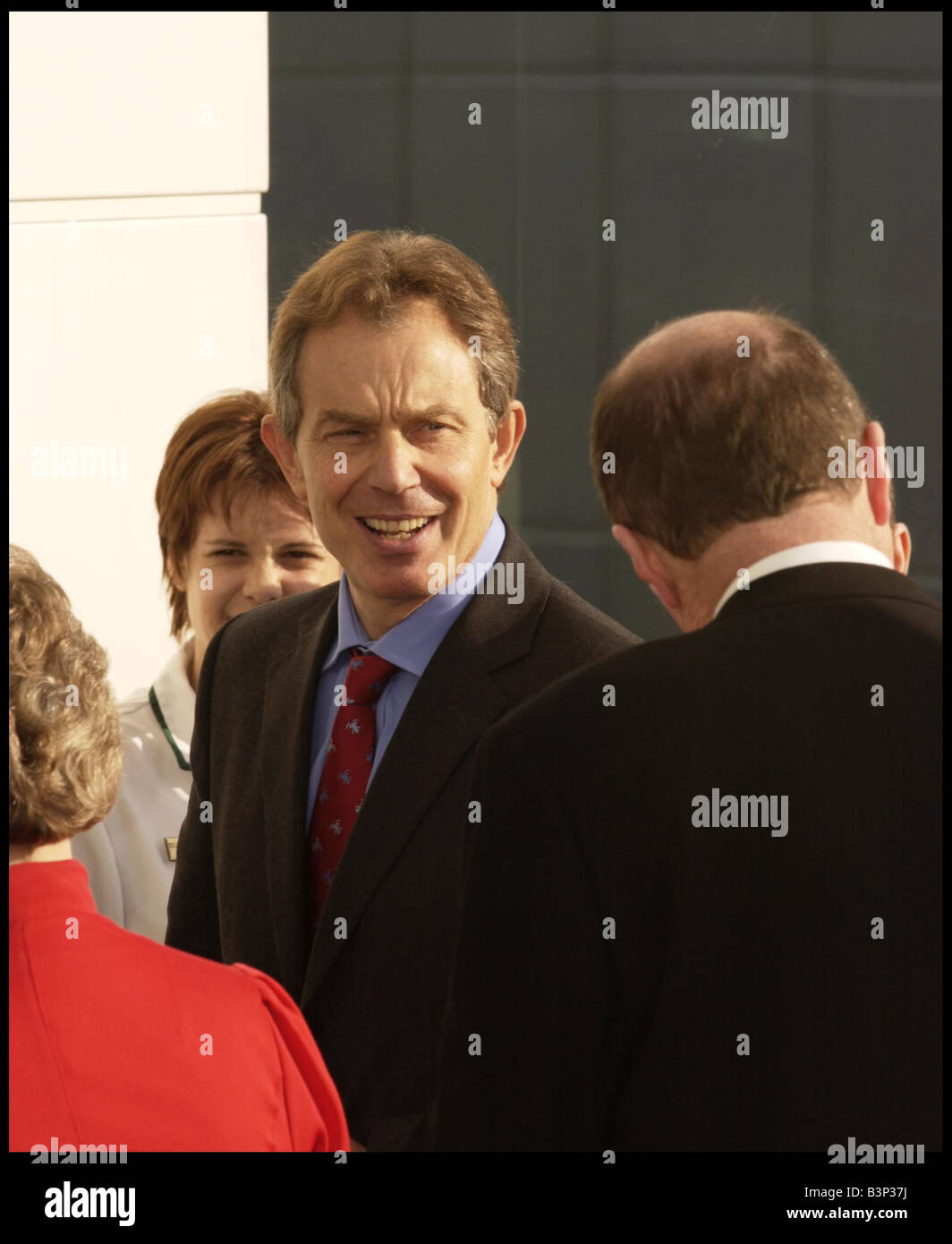 Prime Minister Tony Blair in Edinburgh 14th February 2003 he had a brief visit to the new Edinburgh Royal Infirmary Little France and was met by a small crowd of anti war protestors Stock Photo