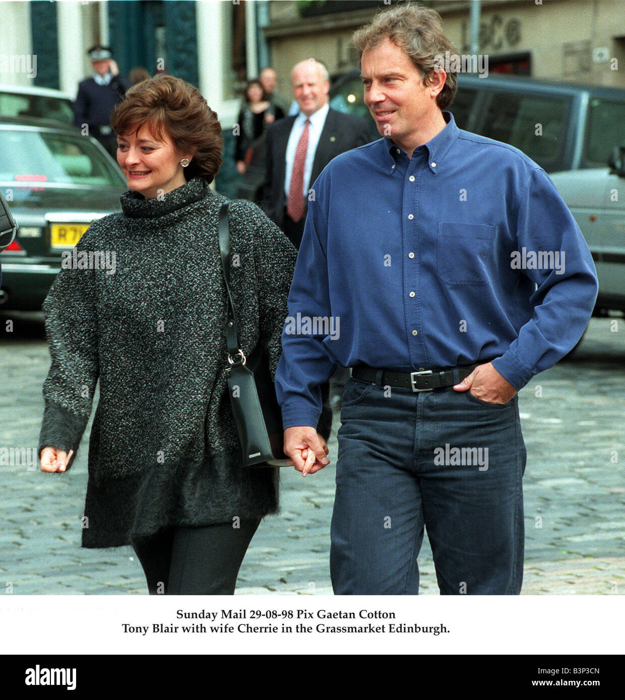 Tony Blair and wife Cherie hand in hand August 1998 in the Grassmarket