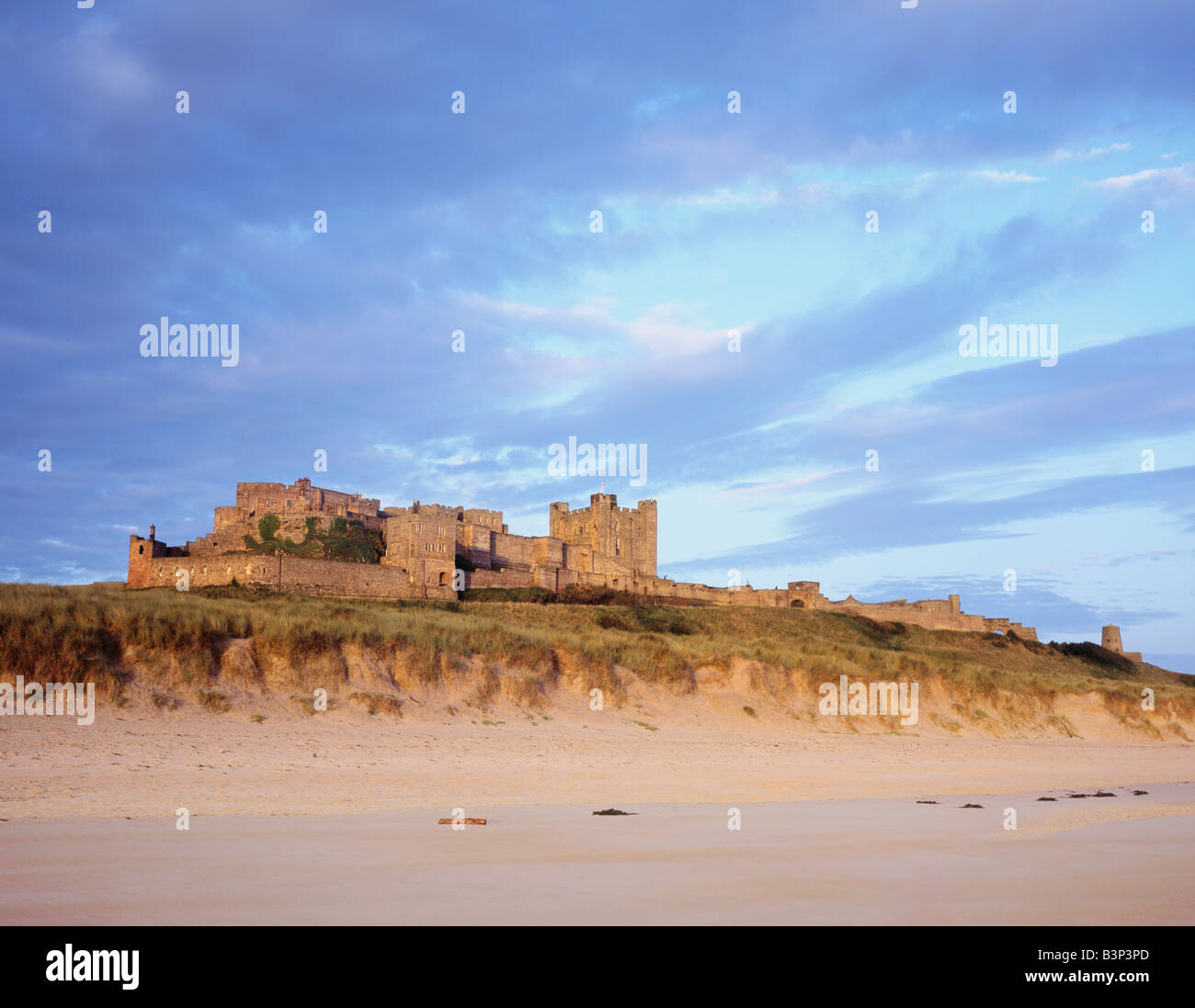 Daybreak over Bamburgh Sands Bamburgh Castle Northumberland United Kingdom Stock Photo
