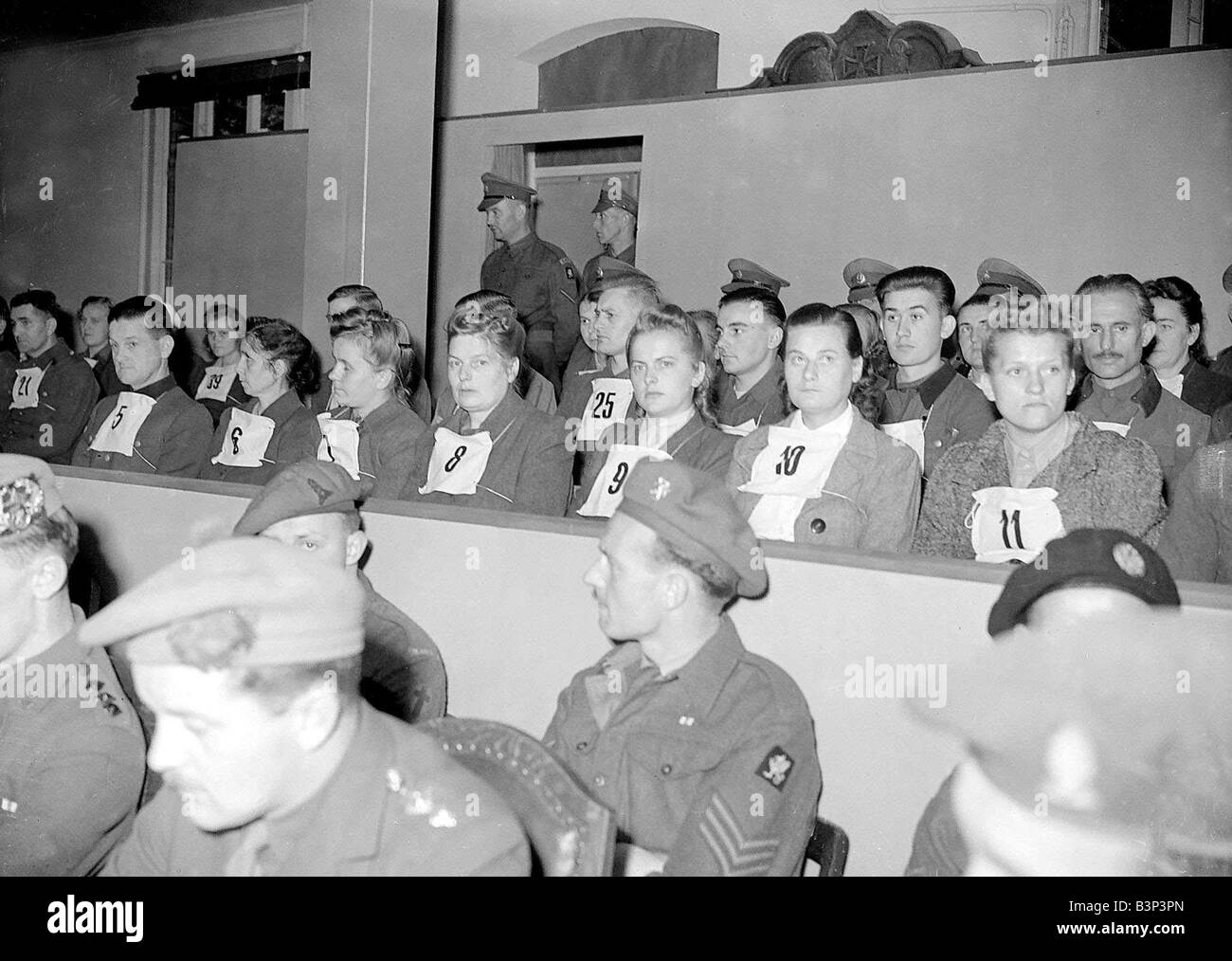 WW2 Belsen Trial 1945 Courtroom scene The camp Kommandant Josef Kramer and members of the SS stationed at Belsen were put on trial by the allies for two charges of war crimes details of which can be found in the paper file Irma Grese was an SS officer in the camp and she was placed on trial separately because she was alleged to have been particularly brutal towards the prisoners She always carried a pistol and a whip with her and one inmate told how two girls who had just been selected to be gassed tried to get away Grese caught them and then shot them in cold blood She would beat prisoners Stock Photo