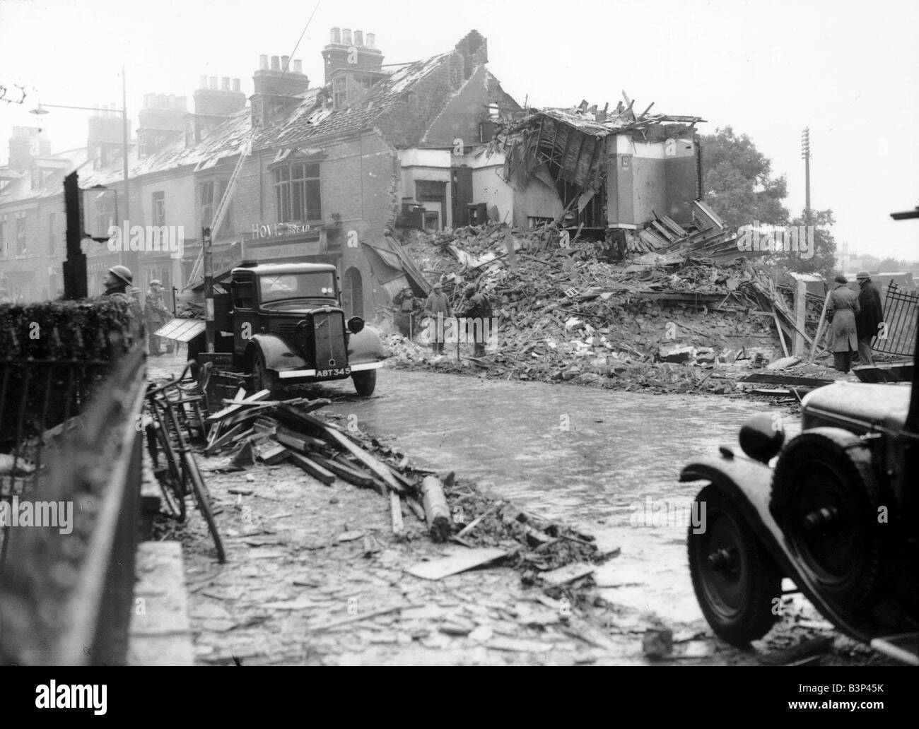 WW2 Air Raid Damage on a London street after a German bombing raid the night before Stock Photo