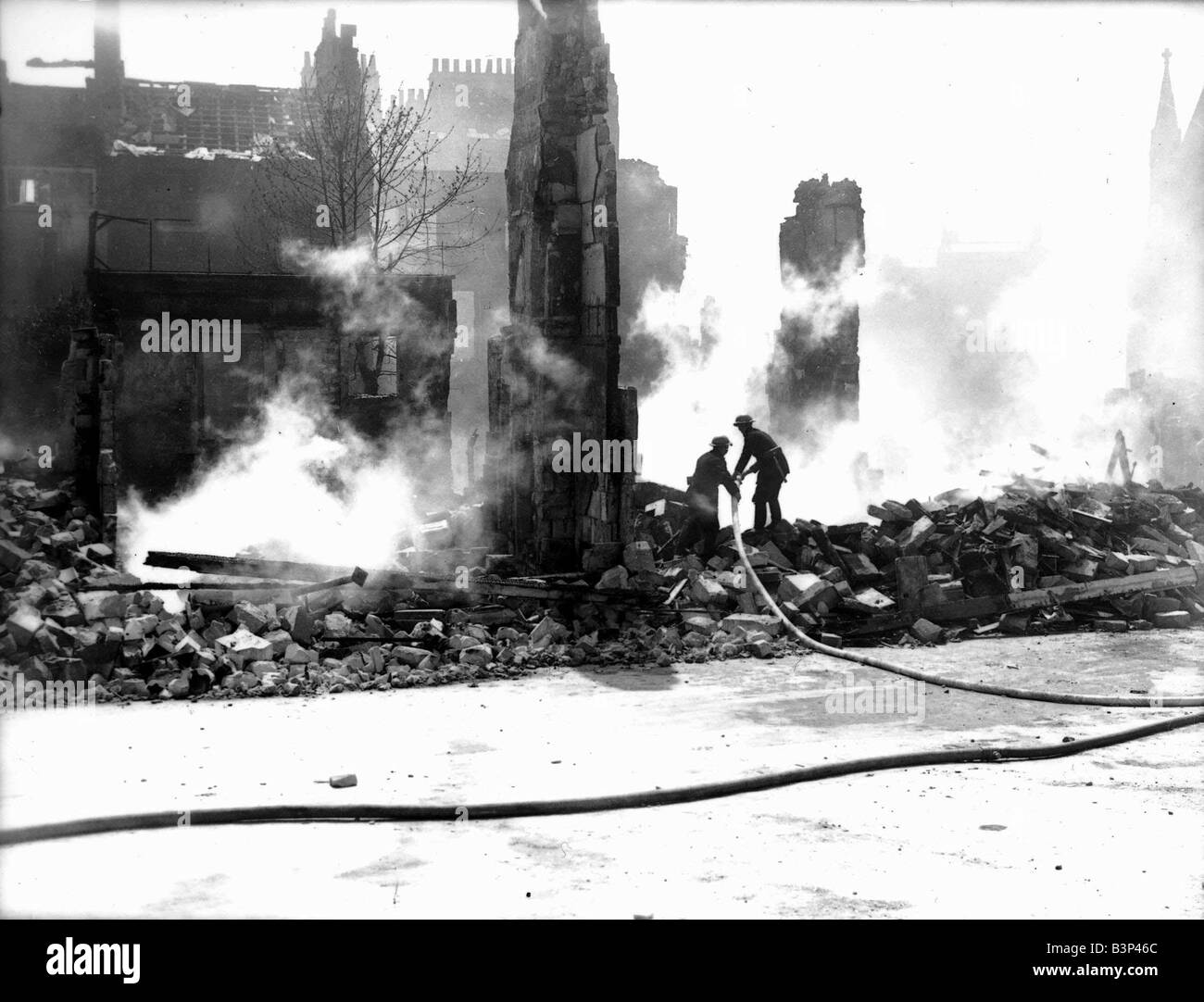 WW2 Air Raid Damage Bomb damage at Bath Fire fighters put out fire at