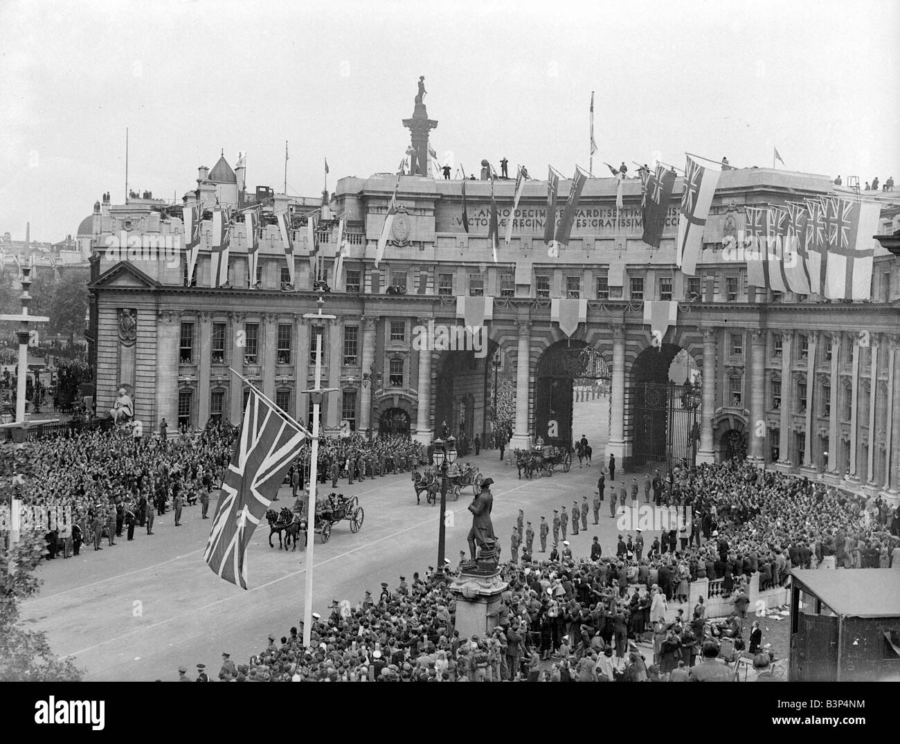Members of the Royal Family pass under Admiralty Arch London during the Victory Day procession Stock Photo