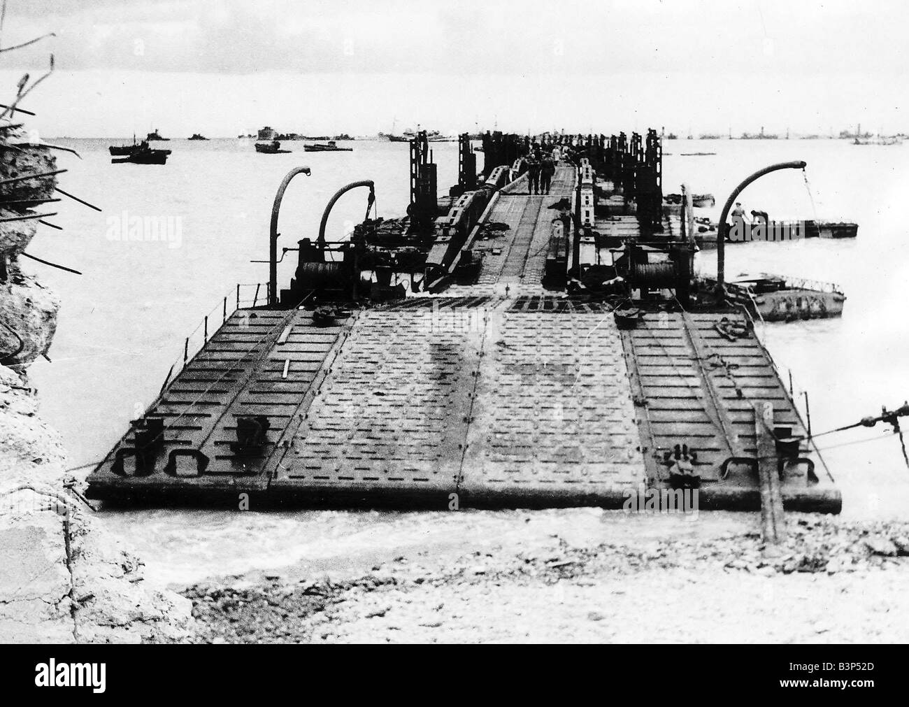 Prefabricated Landing Port Normandy 1944 Two prefabricated ports each as big as Gibraltar were manufactured in Britain in sections and towed across the channel and set down off the coast of Normandy The prefabricated port greatly simplified the problem of supplying the allied armies in France Stock Photo