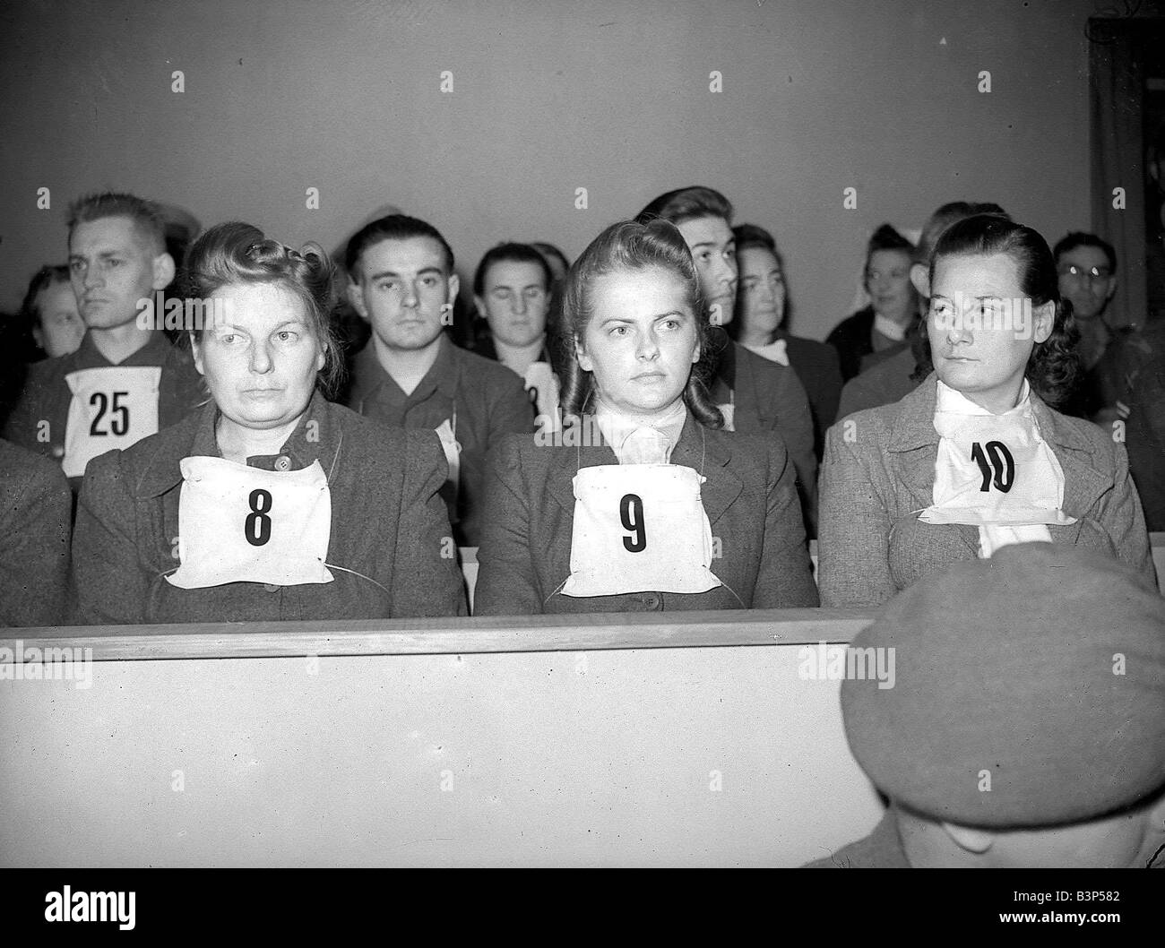 Irma Grese in court with others accused during Belsen trial Sept 1945 The camp Kommandant Josef Kramer and members of the SS stationed at Belsen were put on trial by the allies for two charges of war crimes details of which can be found in the paper file Irma Grese was an SS officer in the camp and she was placed on trial separately because she was alleged to have been particularly brutal towards the prisoners She always carried a pistol and a whip with her and one inmate told how two girls who had just been selected to be gassed tried to get away Grese caught them and then shot them in cold Stock Photo