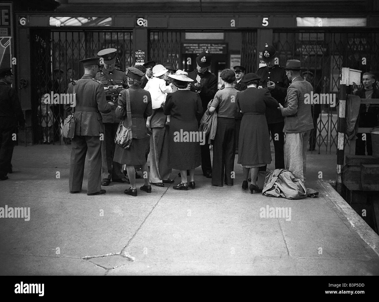 WW2 Holiday Crowds at Railway Station These holiday goers found themselves turned way from their destinations by officers of the Military Police Holiday weekend large rush for the coast as thousands cheered by the news from Russia head off for the long weekend However some resorts were banned Margate Southend and Brighton for example and holidaymakers were turned back by military police causing huge delays and crowds Resorts outside the military defence zone were full to capacity and beyond Stock Photo