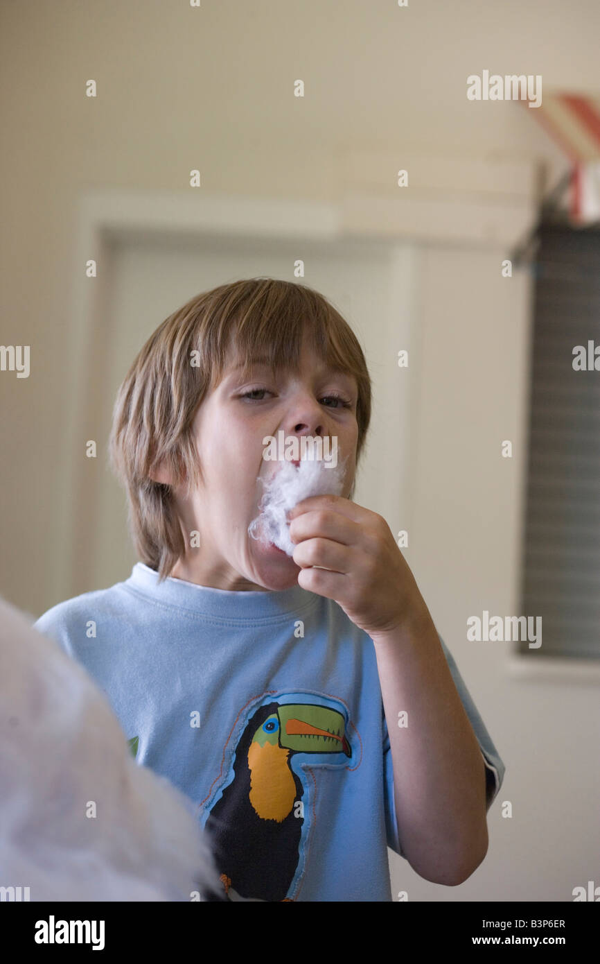 child eating cotton candy Stock Photo Alamy