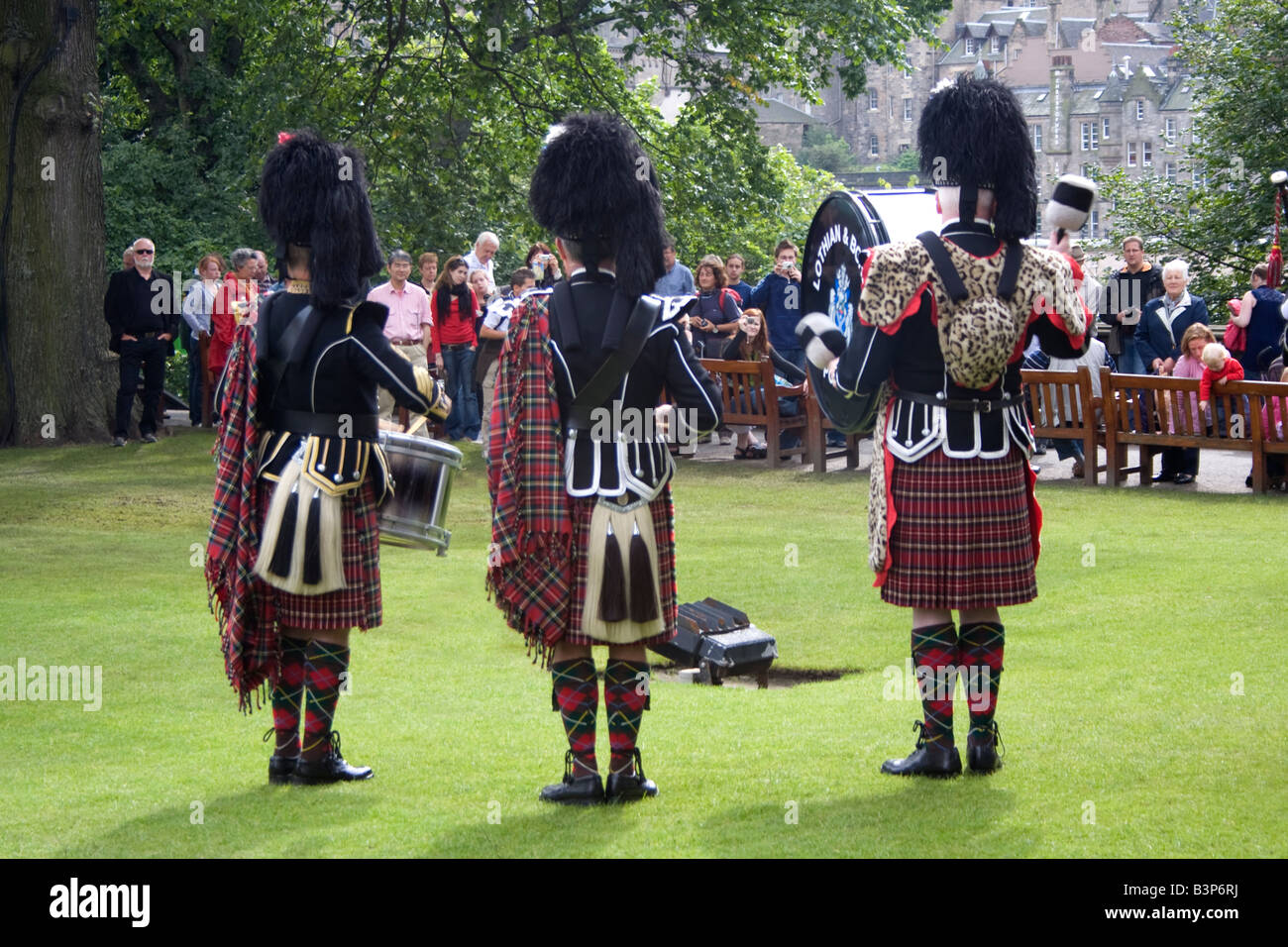 The Lothian and Borders Police Pipe Band traditional performance in Princes Street gardens during the Edinburgh Fringe Festival. Stock Photo