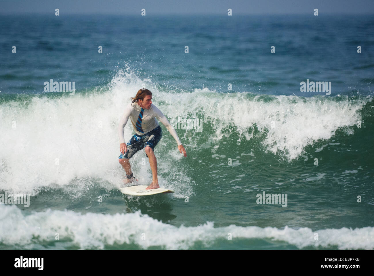 surfing-at-praia-brava-beach-itajai-santa-catarina-brazil-stock-photo