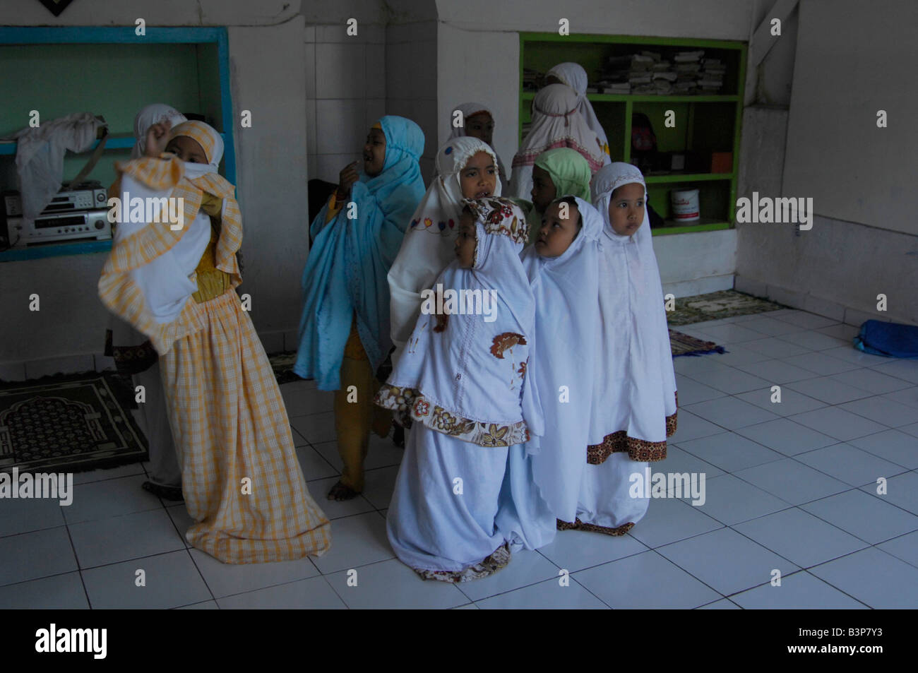 girls  at the charity  sponsored islamic school in slum neighbourhood in kuta , bali , indonesia Stock Photo