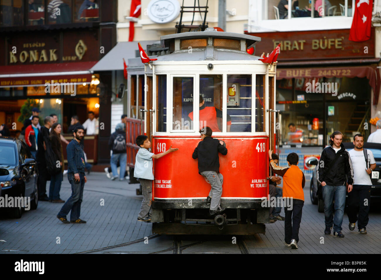May 2008 - Kids on the tram that goes along Istiklal Caddesi Istanbul s  main shopping street in Beyoglu quarter Istanbul Turkey Stock Photo - Alamy