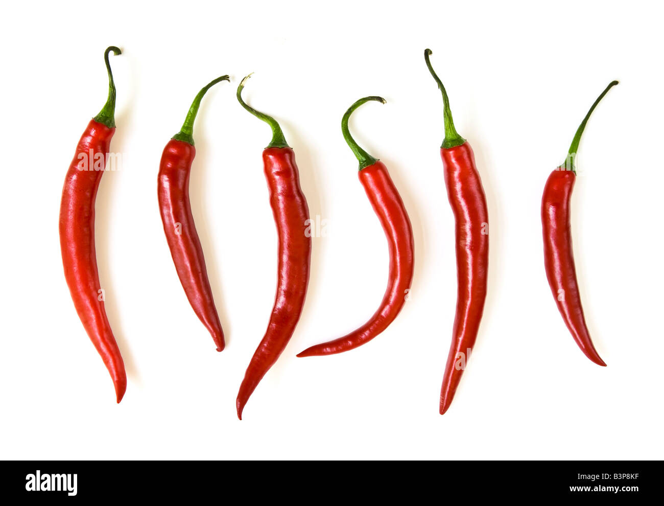 Red hot chili peppers isolated on white background Stock Photo - Alamy