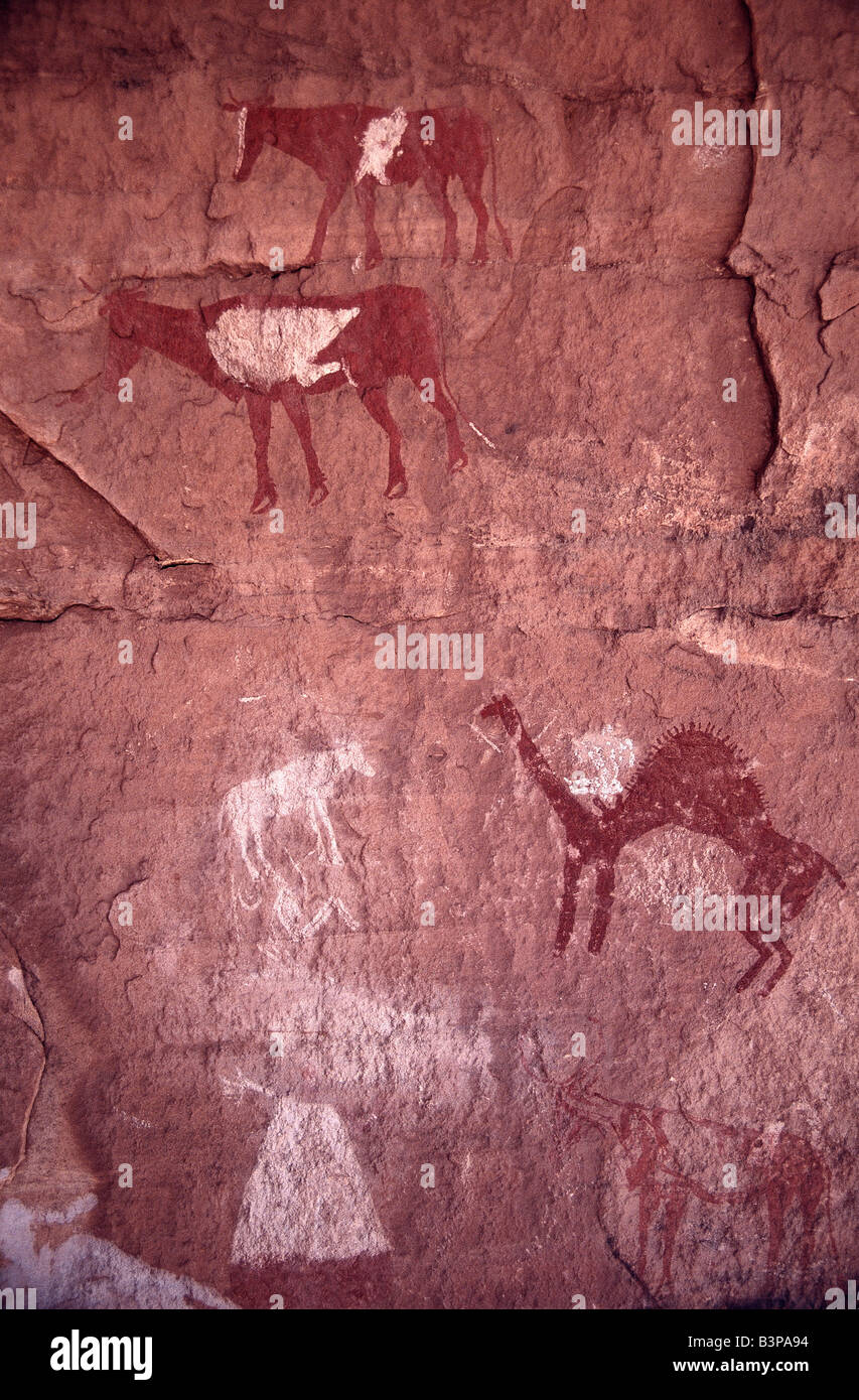 Rock paintings depict animals that existed when the Sahara Desert was green, Libya. Stock Photo