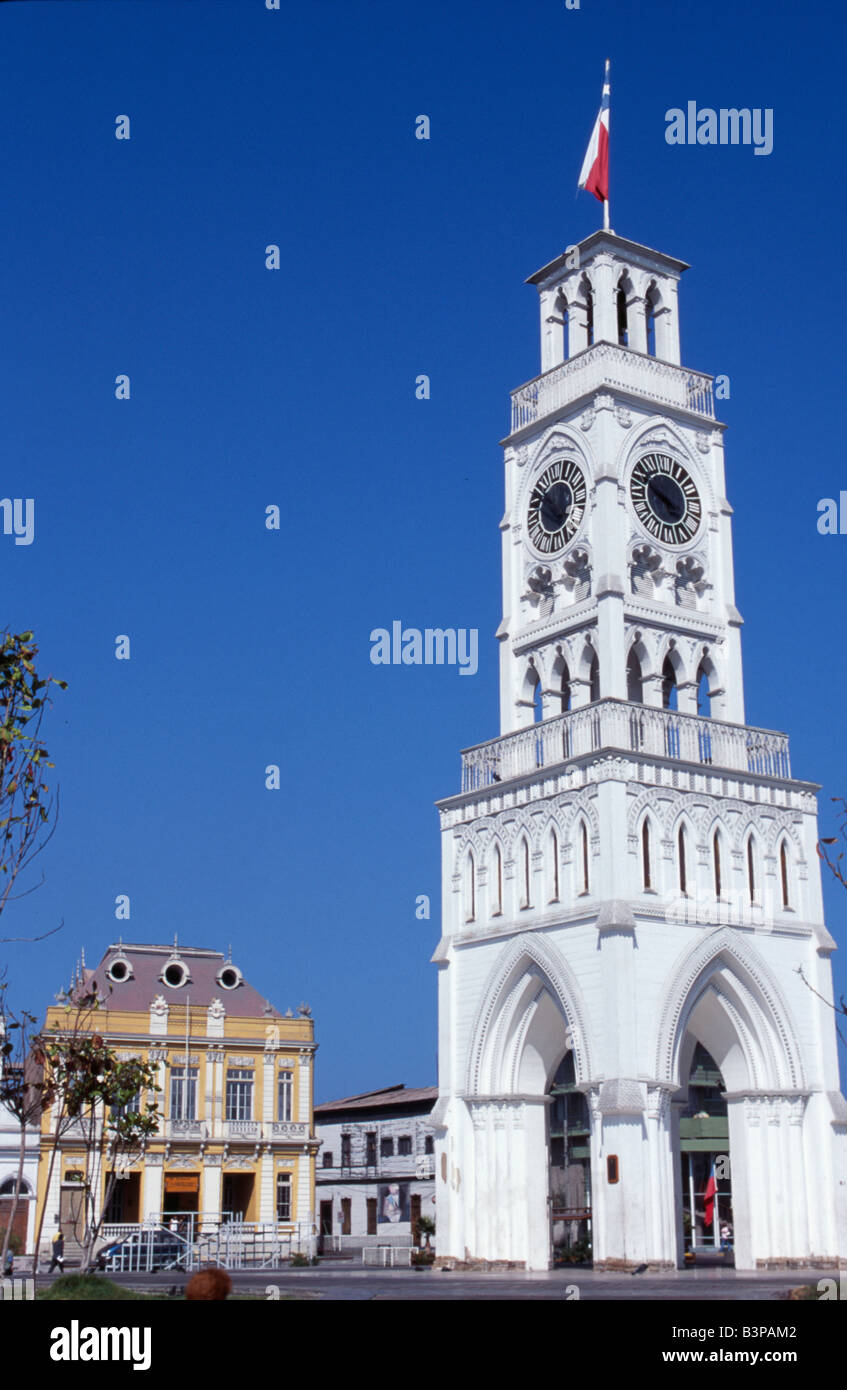 Chile, Region 1, Iquique. Torre Reloj, a tall white clocktower in the  central square, Plaza Prat, has been adopted as Iquique's Stock Photo -  Alamy