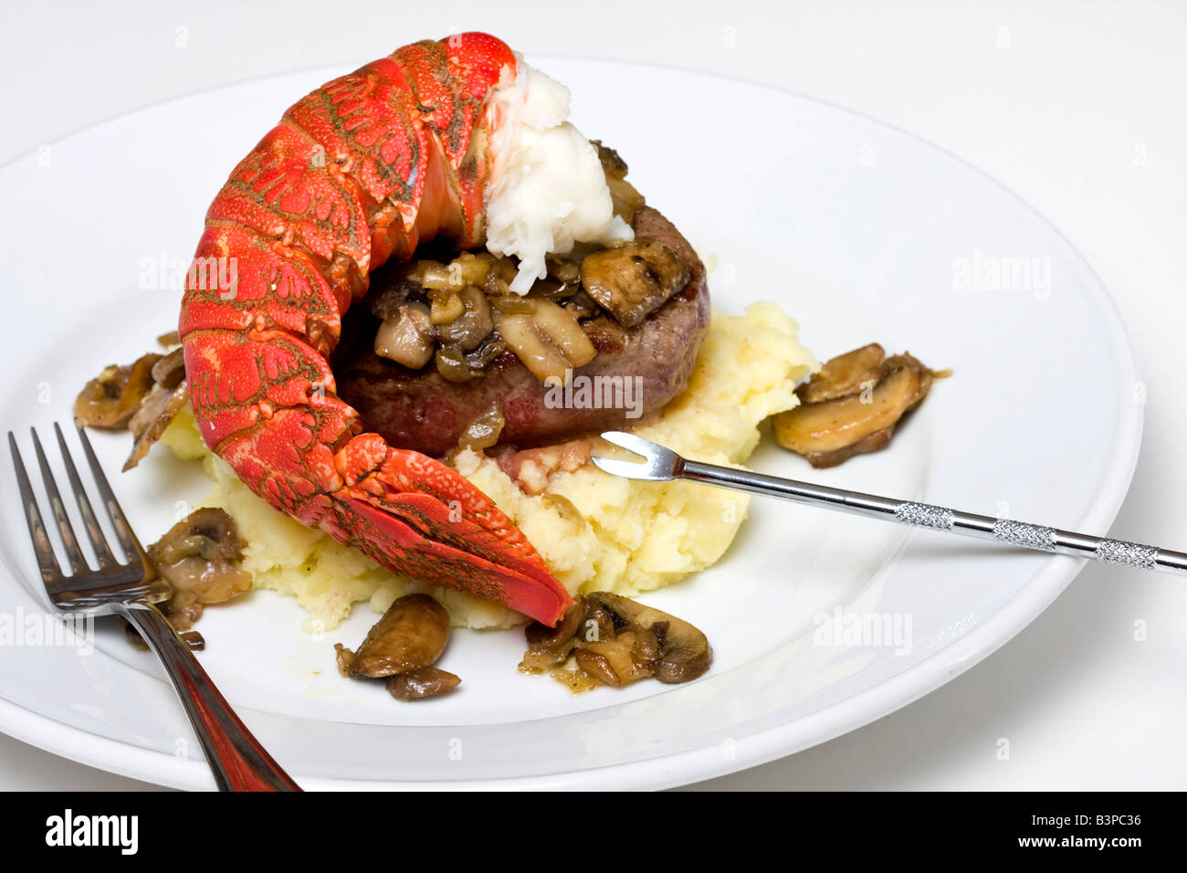 Lobster tail and filet steak meal Stock Photo Alamy