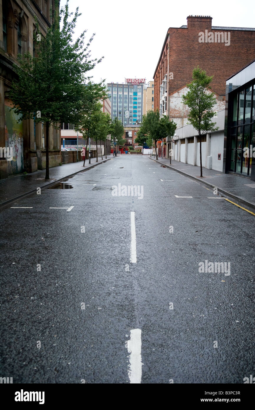 An empty Belfast street with The Europa Hotel in the distance. Stock Photo