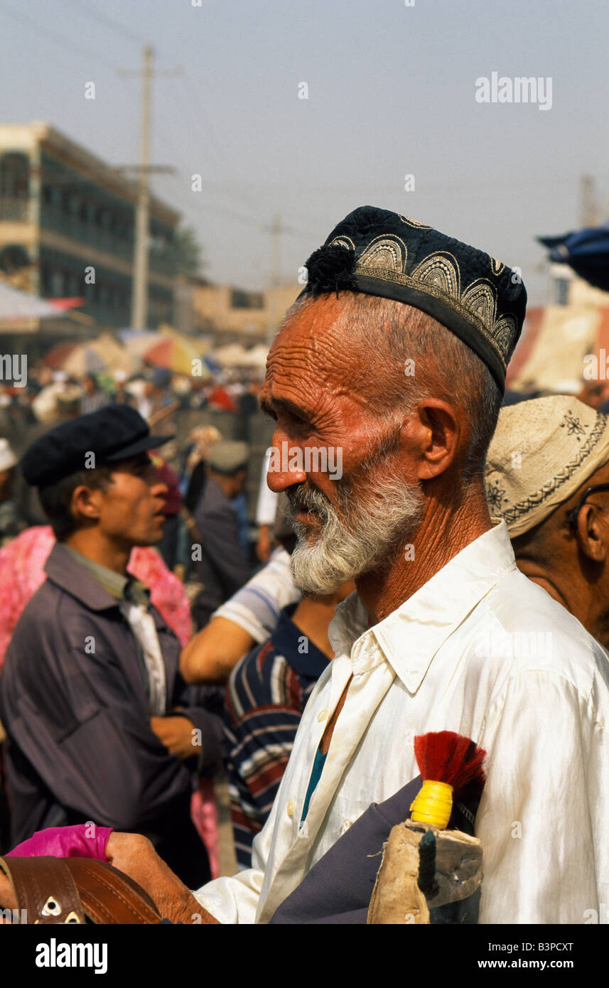 China, Xinjiang Uigur Autonomous Region, Kashgar. An Uigur man Kashgar's Sunday Market Stock Photo