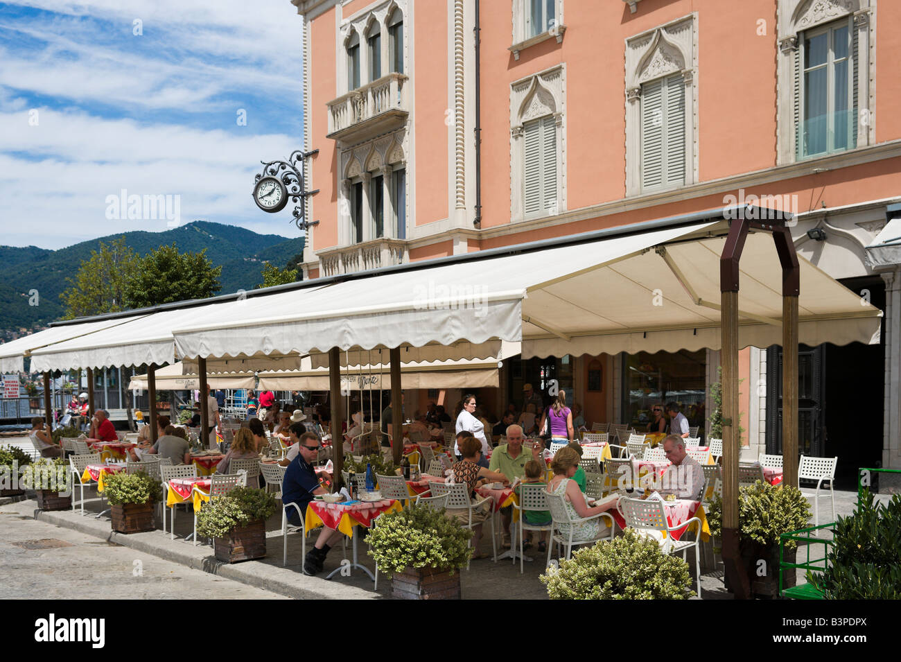 Restaurant near the lakefront, Como, Lake Como, Lombardy, Italy Stock Photo