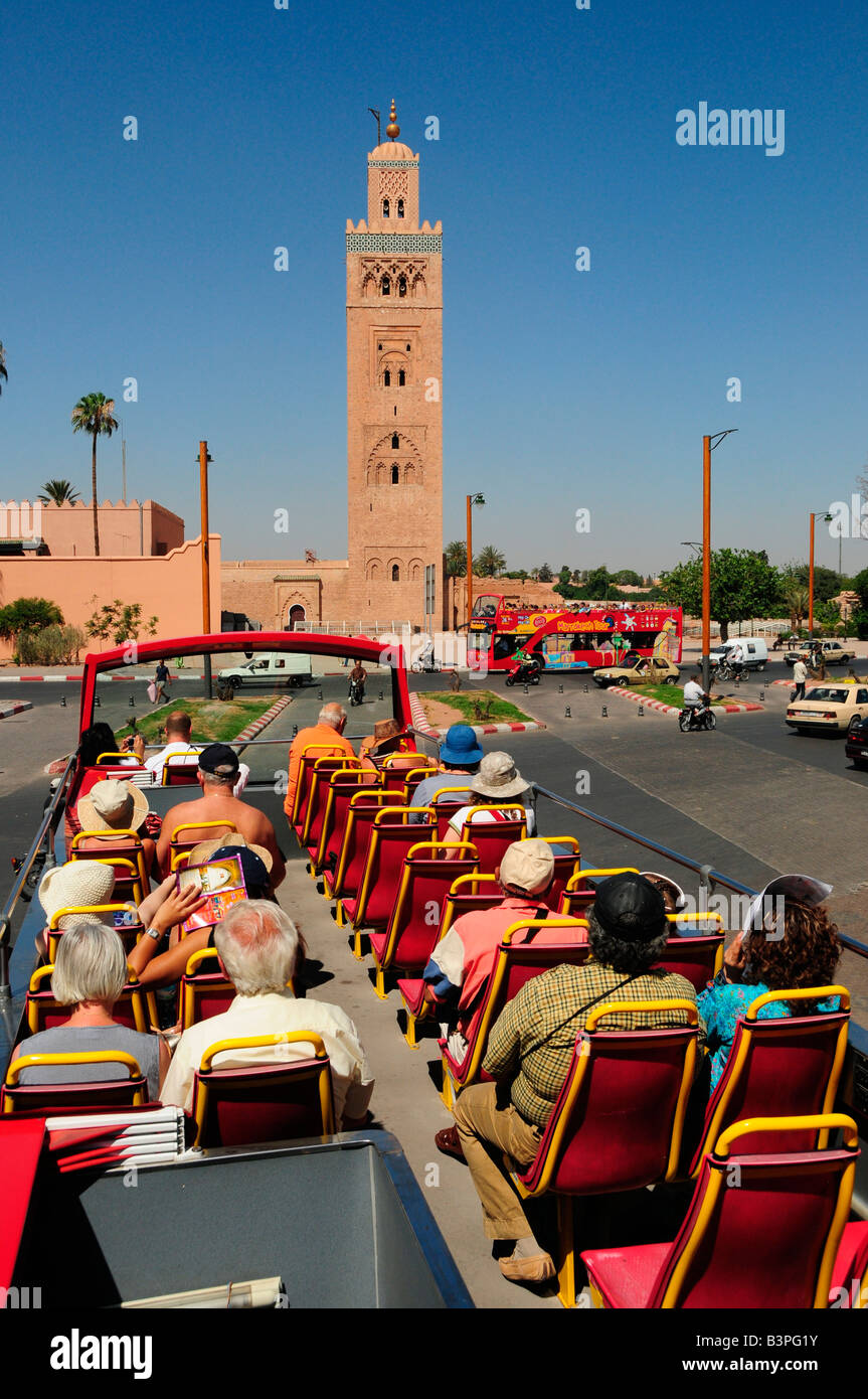 Double decker bus in front of the Koutoubiya-Mosque, Marrakesh, Morocco, Africa Stock Photo