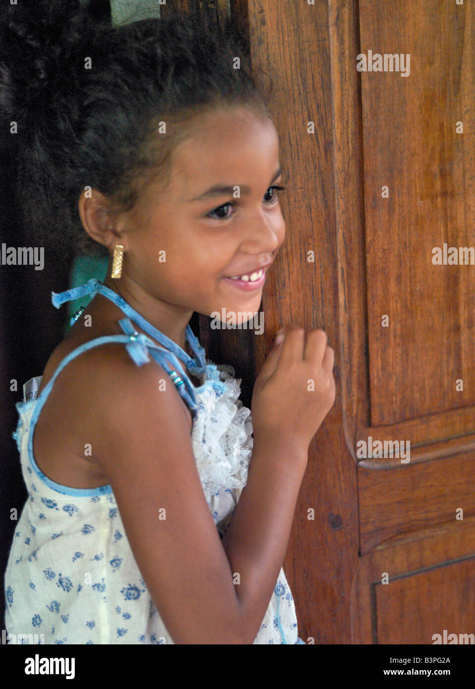 Northern Madagascar, A young Malagasy at her home in Ramena, a fishing village a short distance from Antsiranana, more commonly known as Diego. Stock Photo