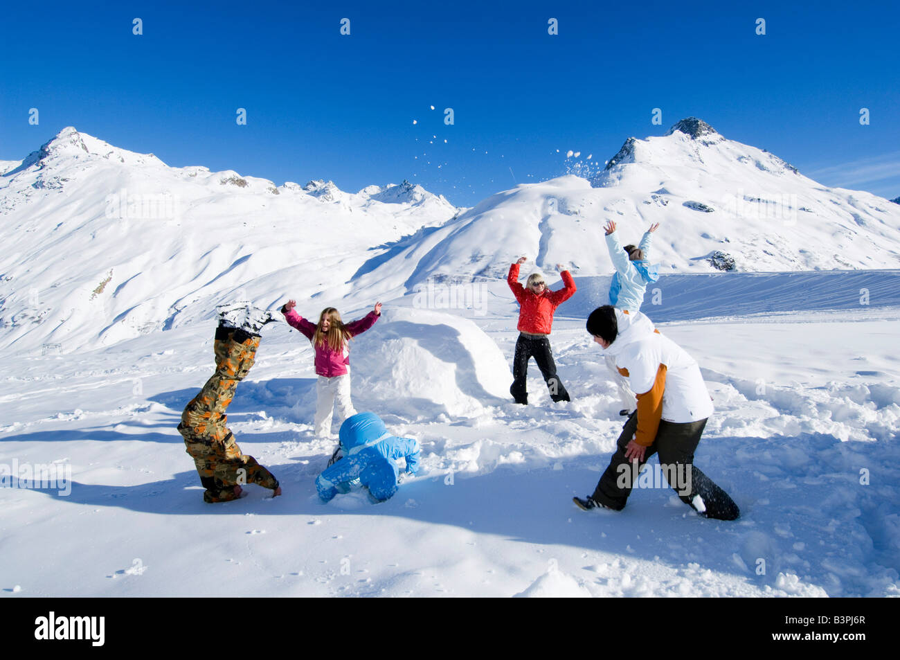 Children having a snowball fight, Galtuer, Tirol, Austria, Europe Stock Photo