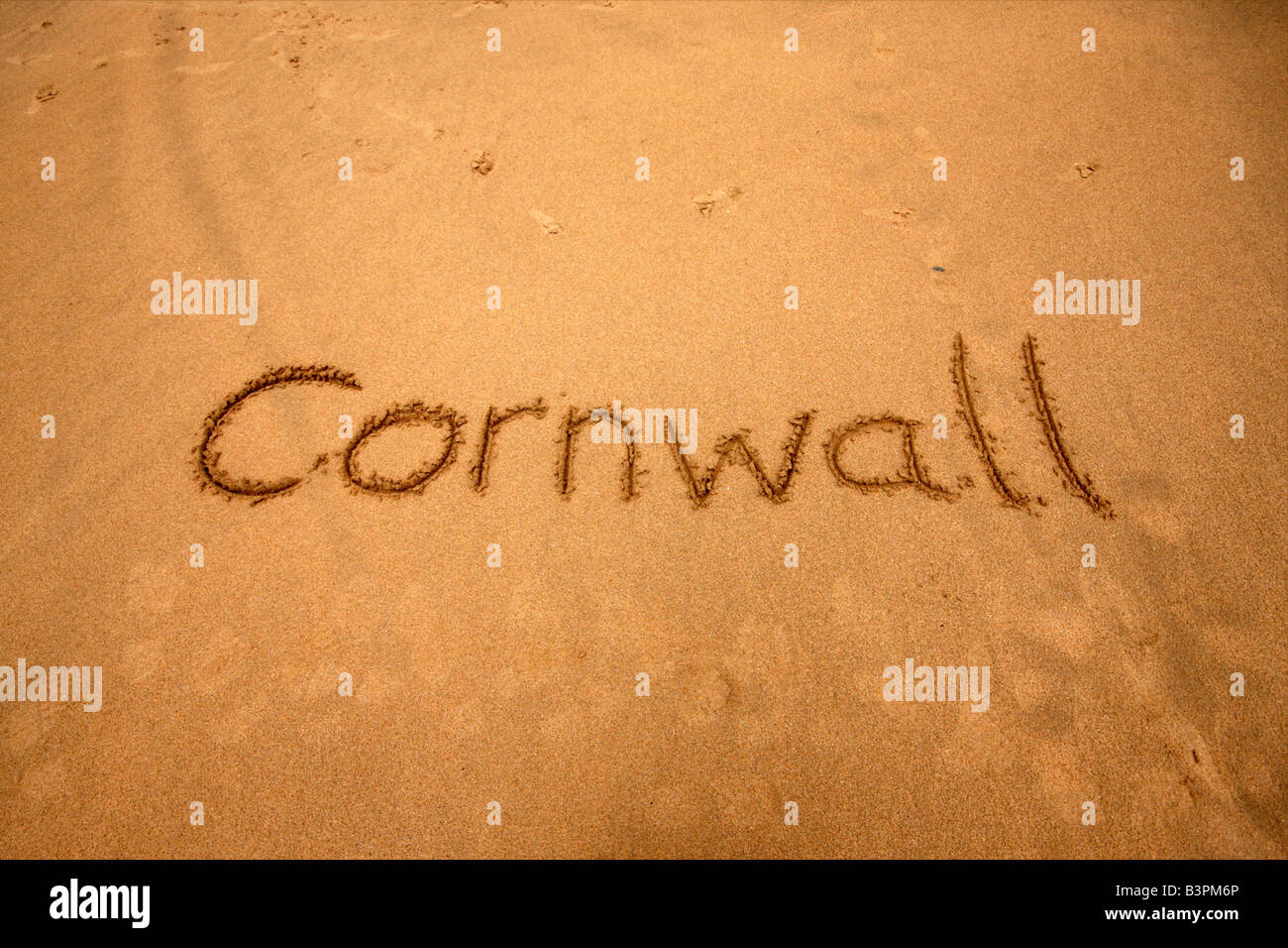 The word Cornwall written into a cornish beach Stock Photo Alamy