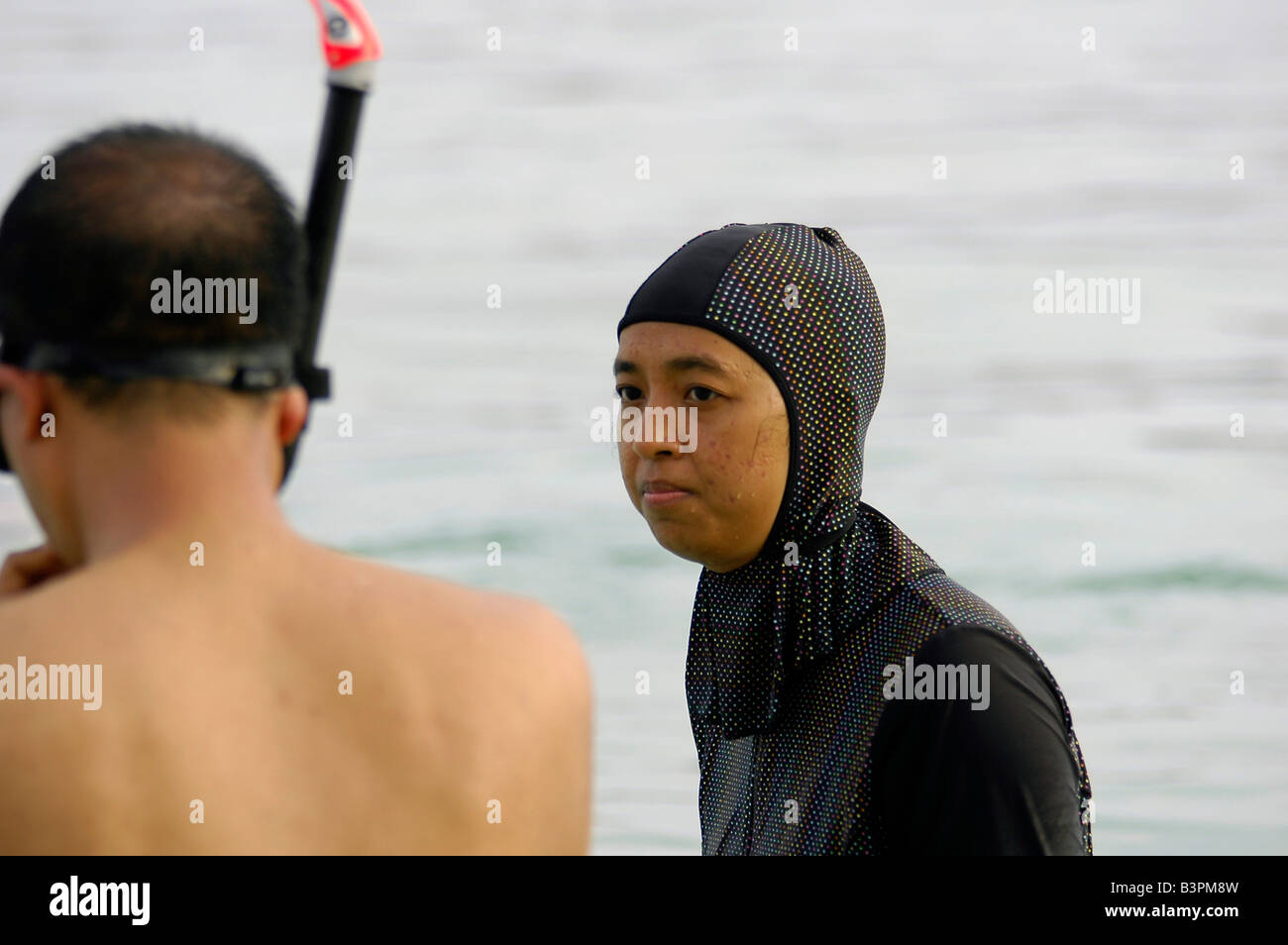 An Indonesian woman wearing a "burqini", an Islamic bathing suit for