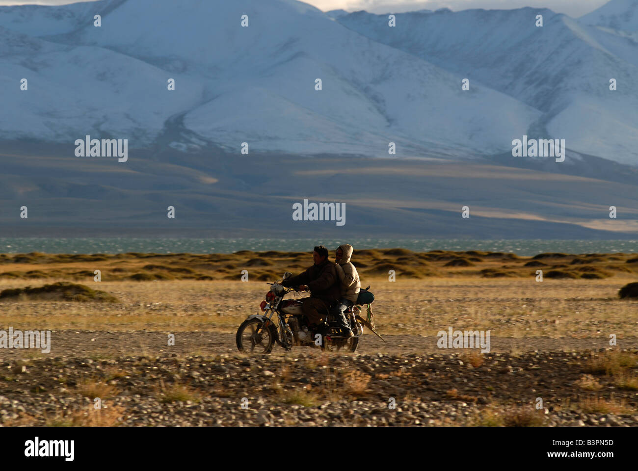 Motorbikers near Manasarovar Lake, Ngari province, West Tibet Stock Photo
