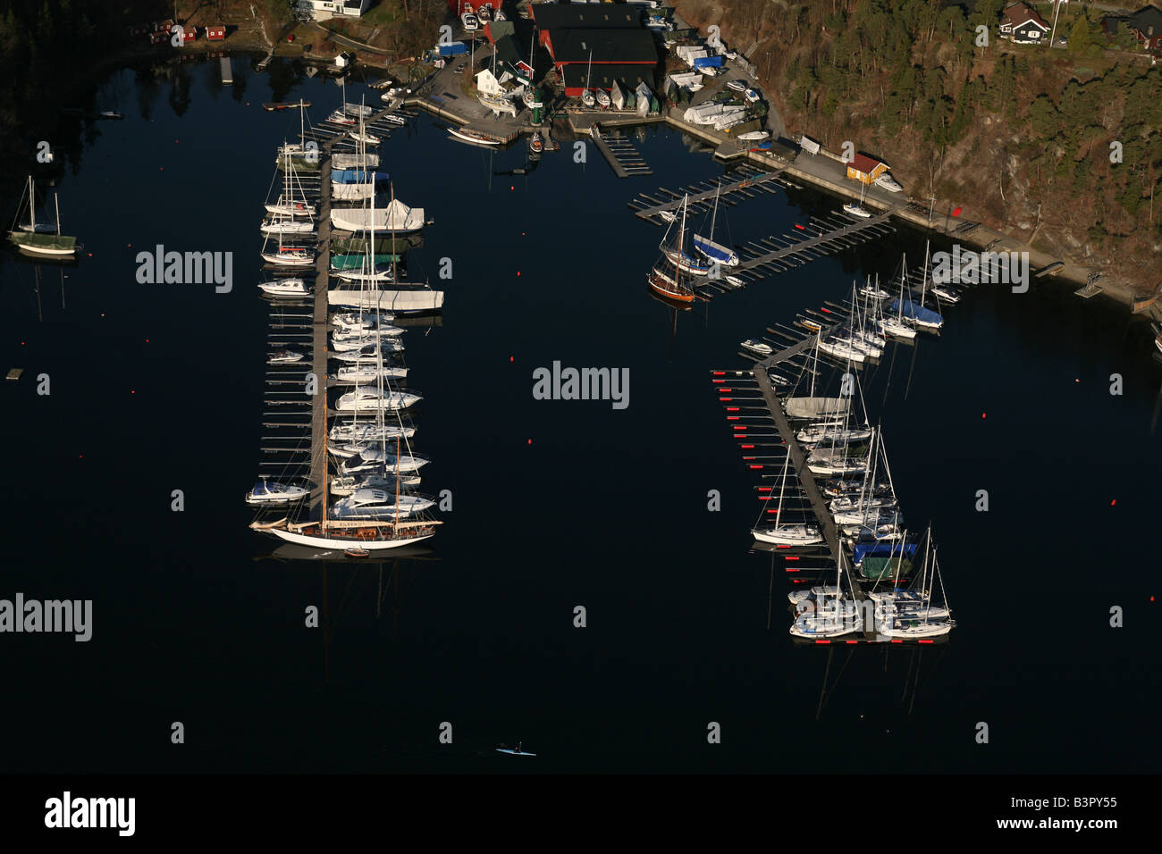 Aerial view of a pontoon with yachts tied to it. Early spring in Oslo, Norway, Europe Stock Photo