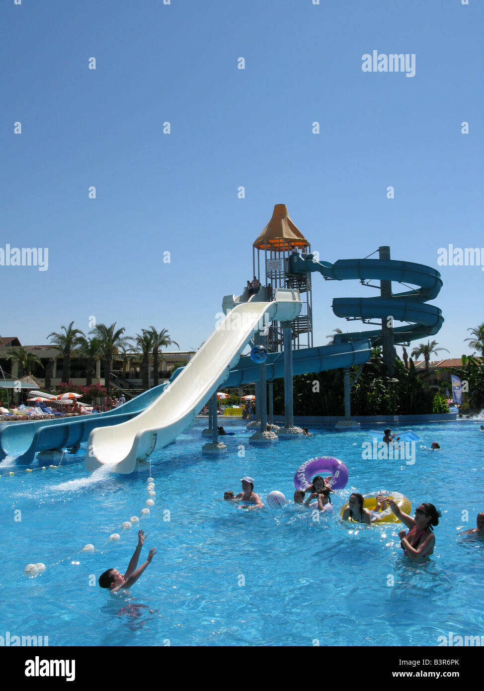 Swimming pool with water slide , holiday resort, Turkey Stock Photo