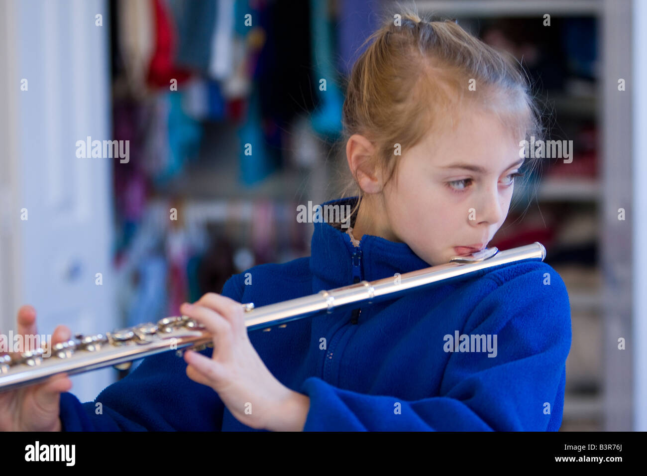 Child playing the flute Stock Photo - Alamy