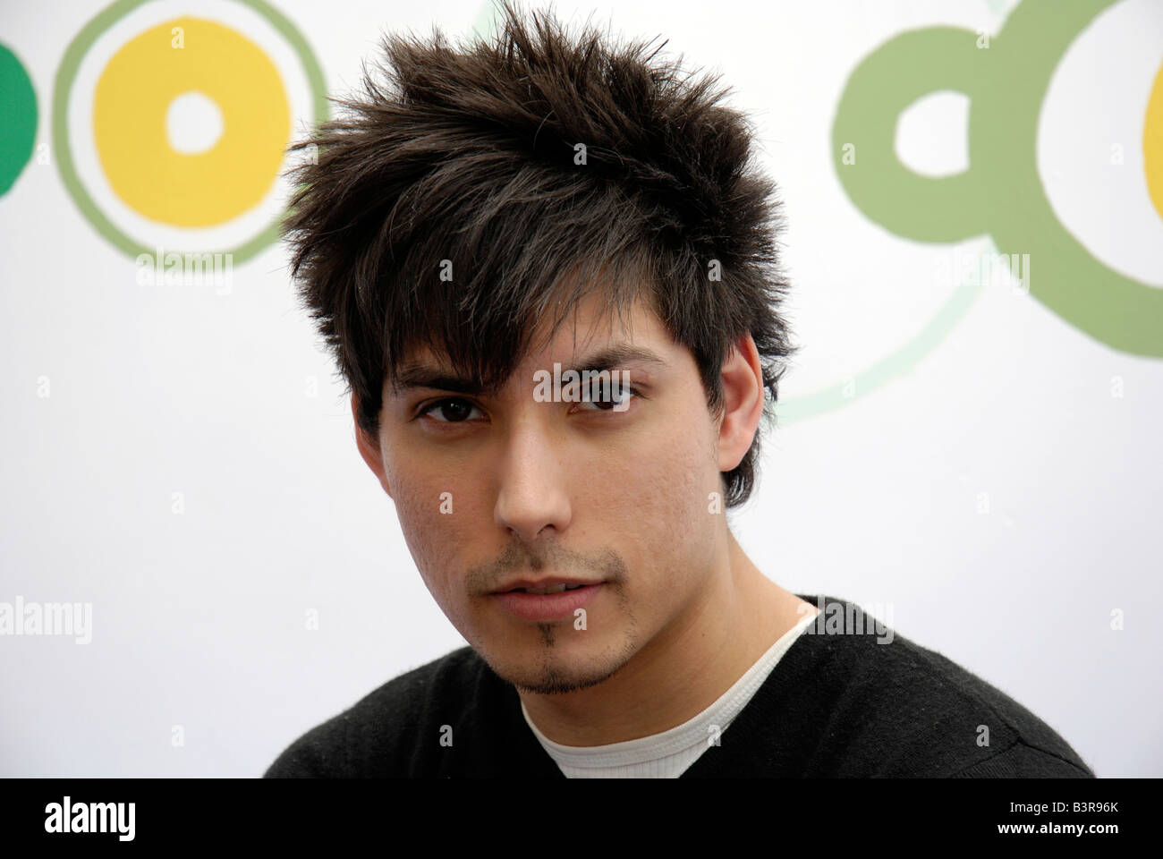 Cool young man in a funky modern office interior Stock Photo