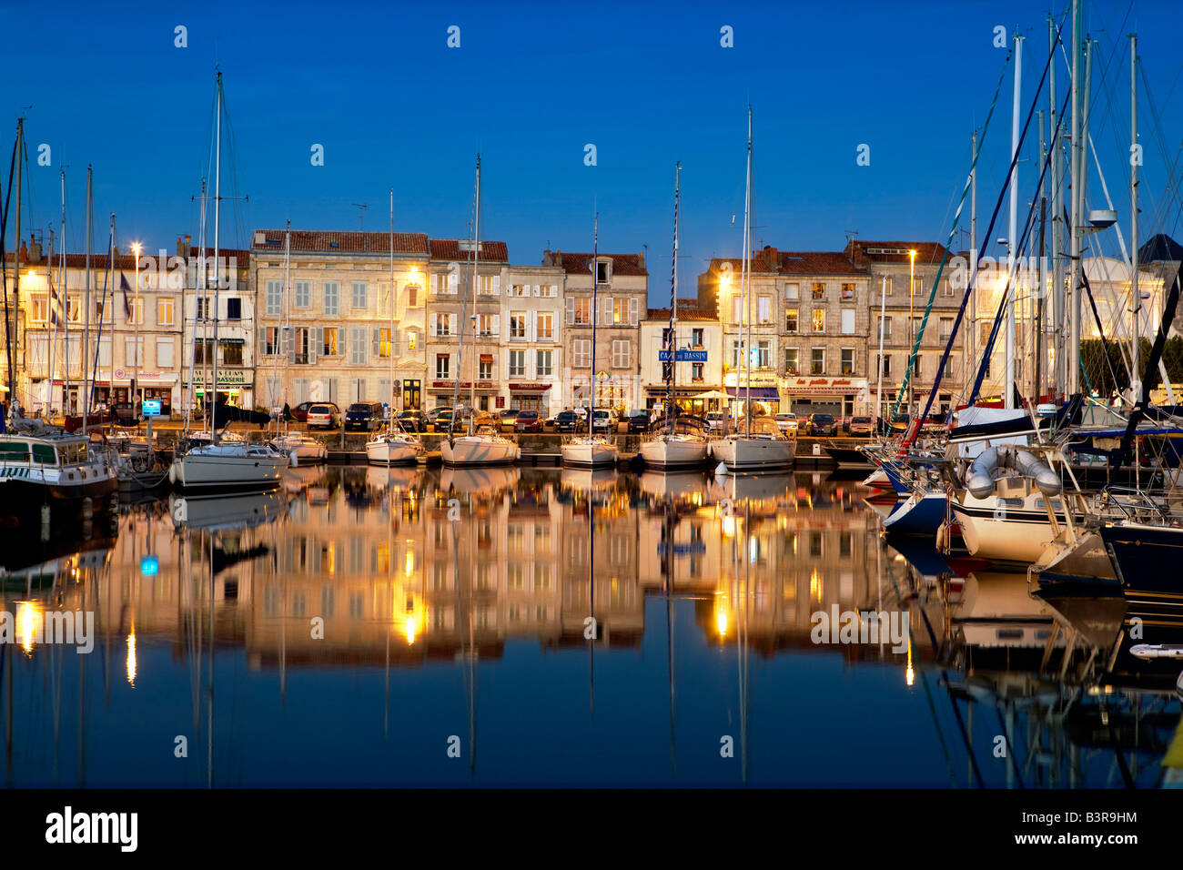 La Rochelle harbour at night in Poitou Charentes France Stock Photo