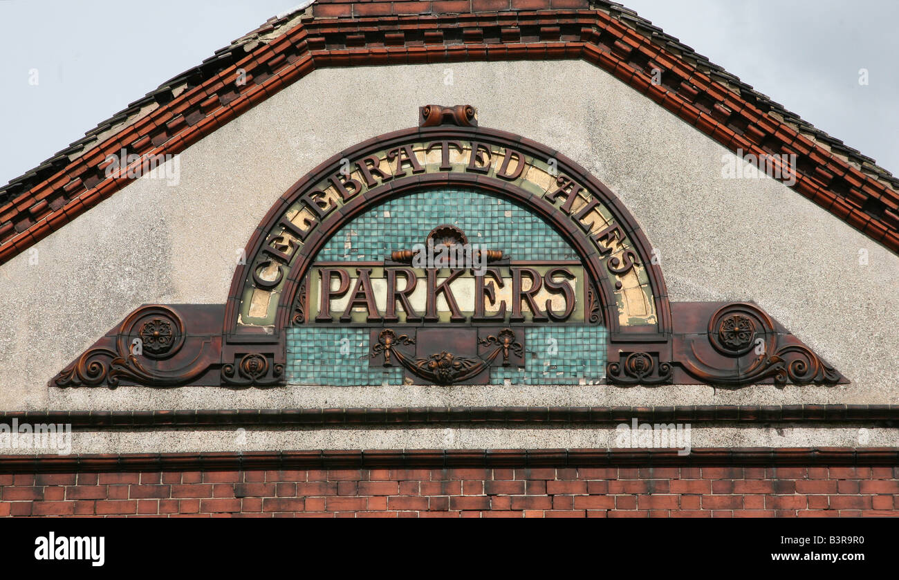Ceramic tiled pub sign showing Parkers Celebrated Ales on a derelict public house in Stoke-on-Trent, Staffs Stock Photo