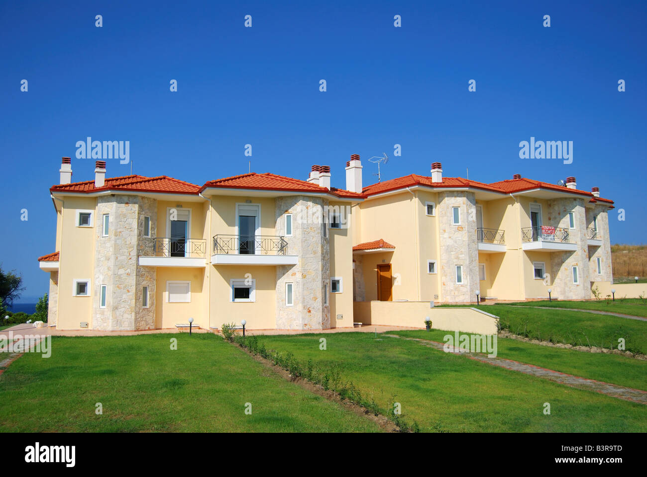 Modern holiday apartments, Hanioti, Kassandra Peninsula, Chalkidiki, Central Macedonia, Greece Stock Photo