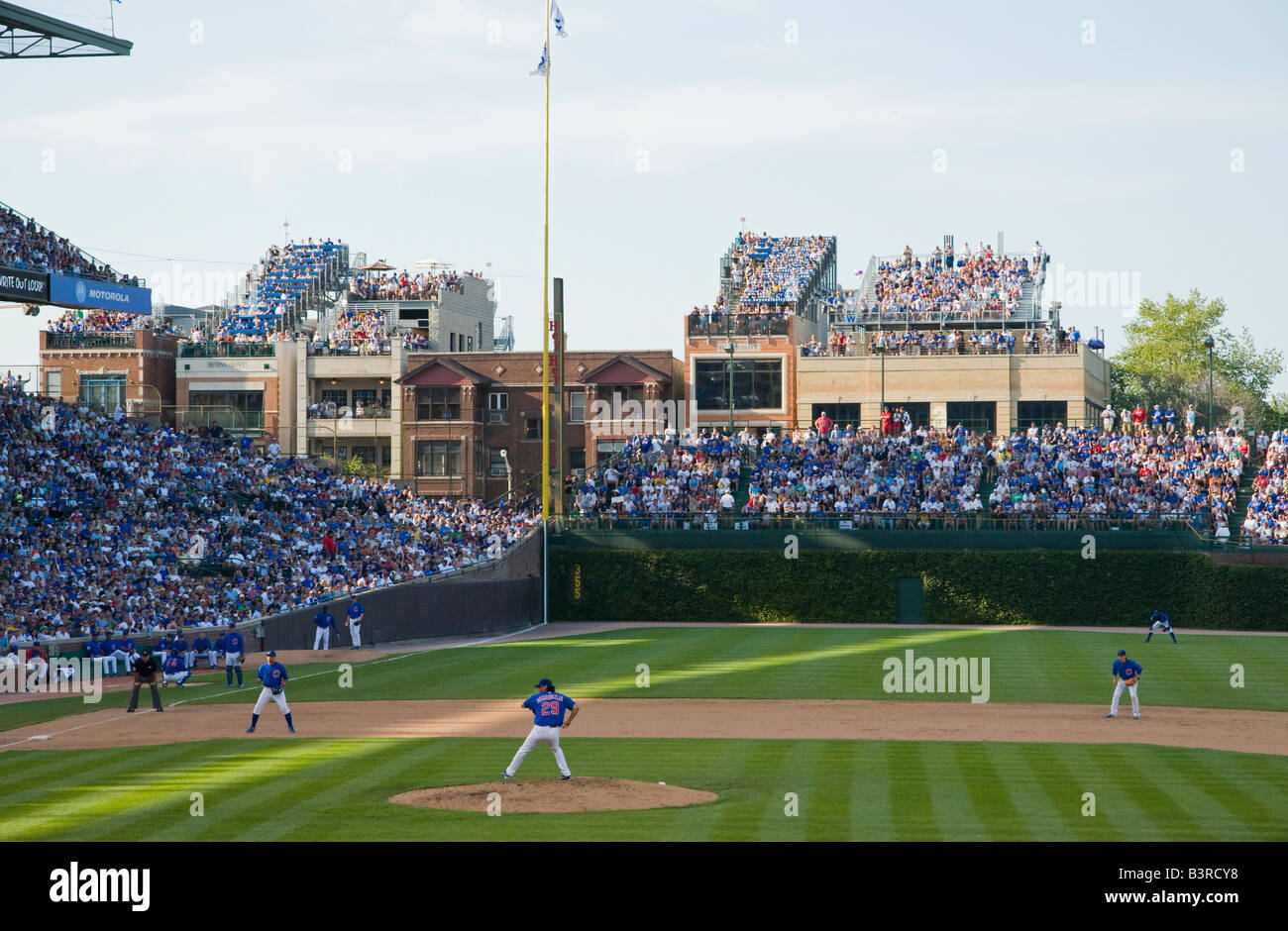 Chicago Cubs Wrigley Field unauthorized roof top seats across the street on  building rooftops Stock Photo - Alamy