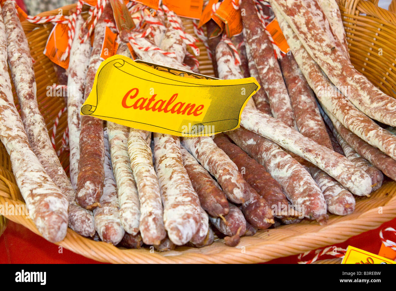 Catalonian sausages are being offered at a market stall at Céret in Southern France Stock Photo