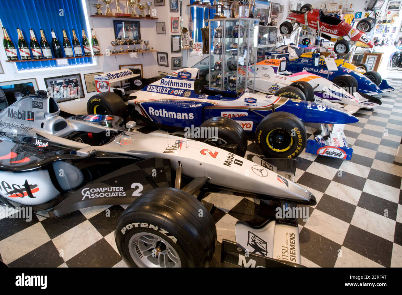 Formula One F1 racing cars inside the David Coulthard Museum Twynholm Scotland Stock Photo