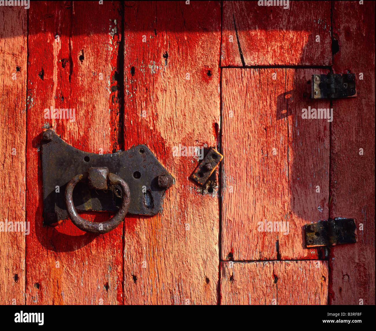A red barn door at Angram in Swaledale, The Yorkshire Dales National