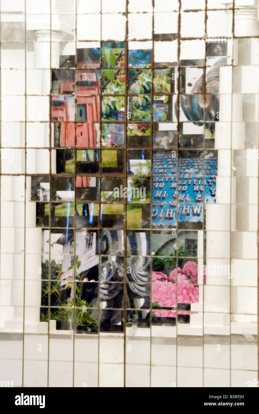 Grove House, Oxford, UK, Nov 2006: photo montage displayed in an alcove with two pillars reflected in a tiled mirror, abstract. Stock Photo
